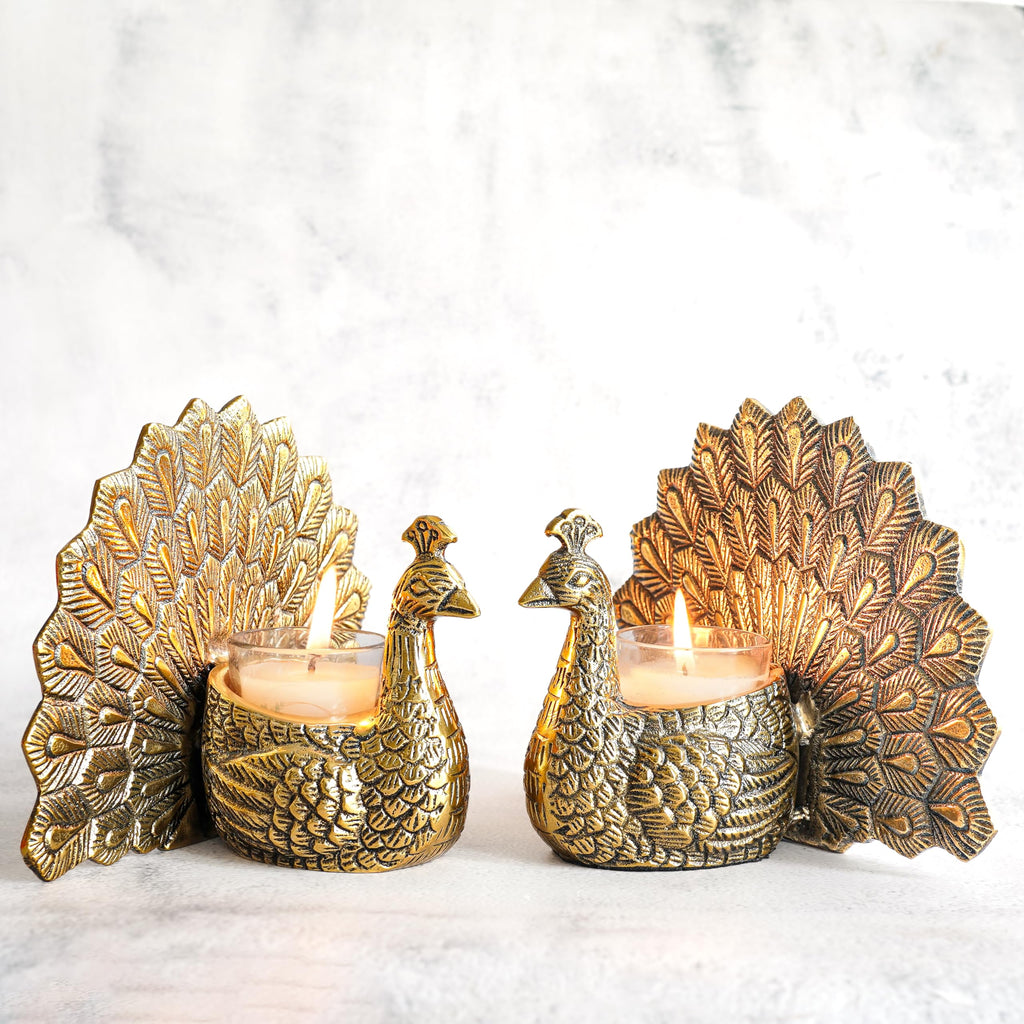 BEHOMA Aluminium Dancing Peacock Pair Figurine for Good Luck and Love | for Home Decor Tabletop Living Showpiece for Valentine's Day, Birthday(Scented Glass Votive Candle Included), Gold,18.5 Cm,11 Cm
