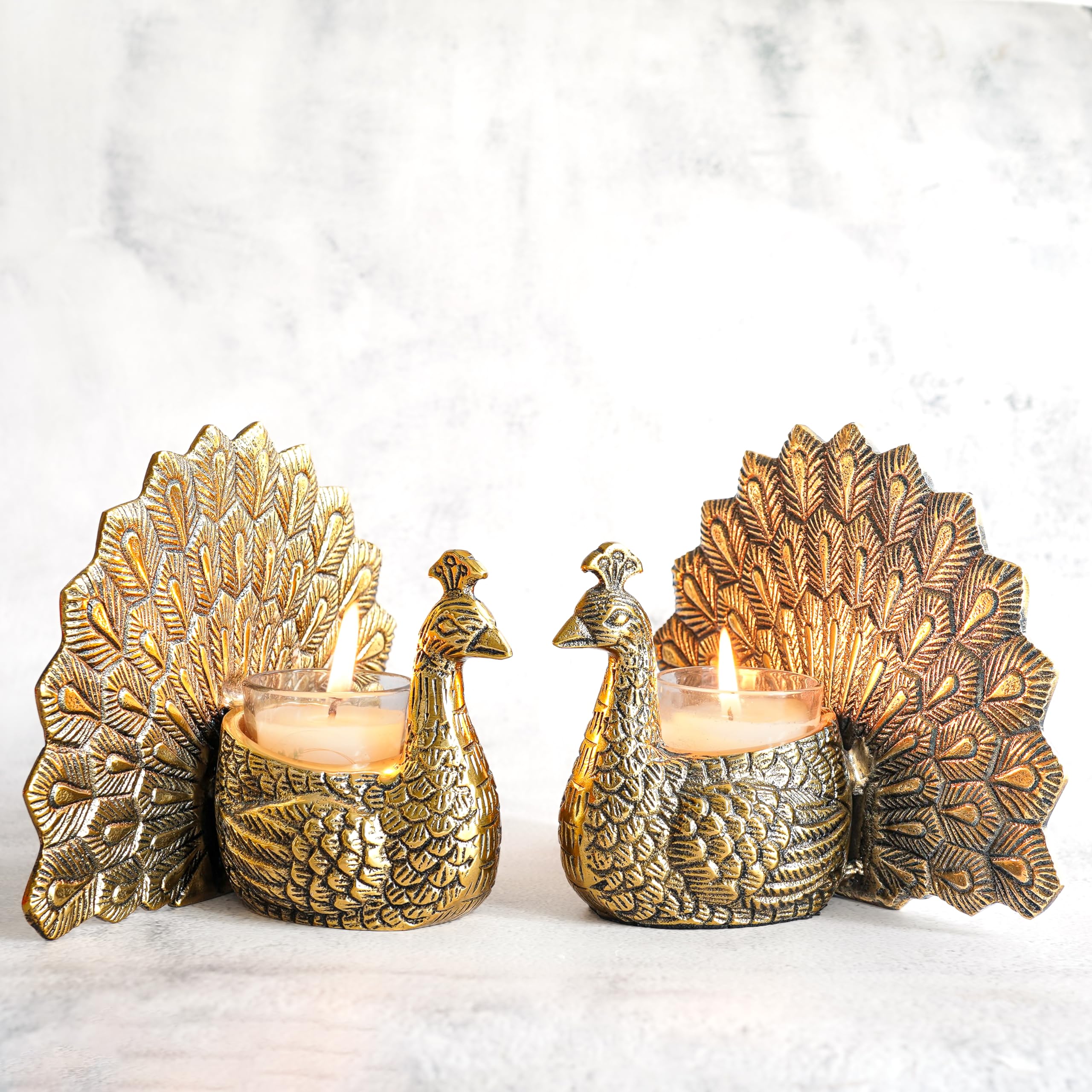 BEHOMA Aluminium Dancing Peacock Pair Figurine for Good Luck and Love | for Home Decor Tabletop Living Showpiece for Valentine's Day, Birthday(Scented Glass Votive Candle Included), Gold,18.5 Cm,11 Cm